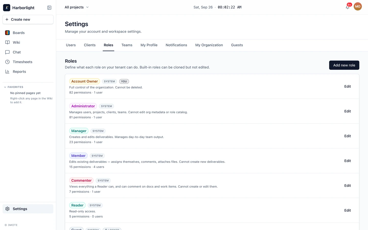 The Roles tab listing the system roles, with the System, Locked and You badges.